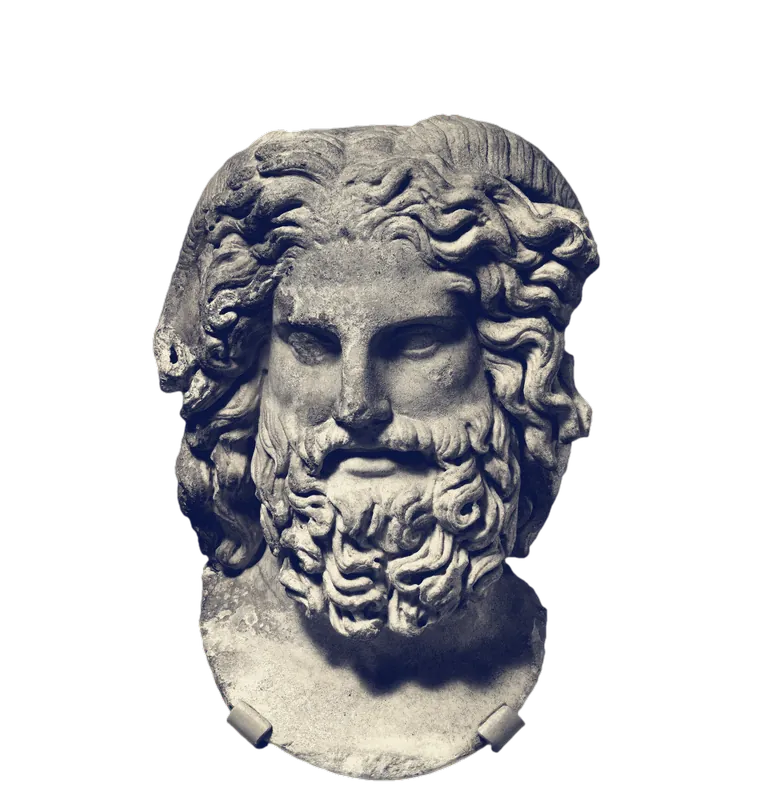 A marble head of Zeus Ammon with a full beard and waves of hair, the holes for ram's horns above the ears